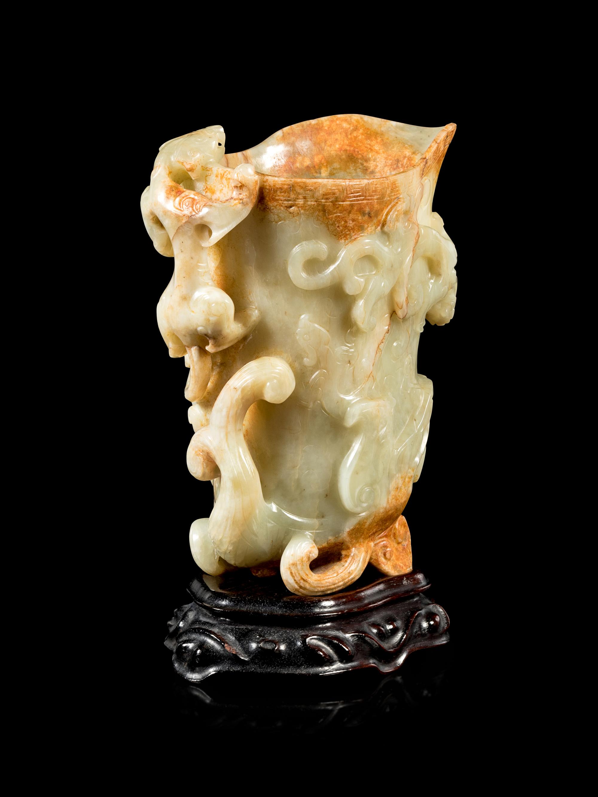 A Russet and Pale Celadon Jade 'Chilong' Rhyton Cup