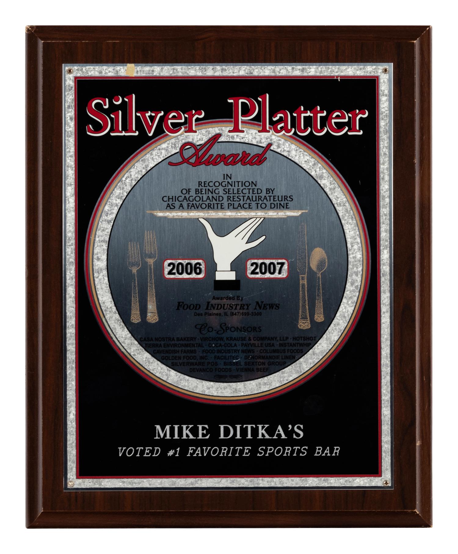 A Group of Nine Dining Awards and Honors Formerly Displayed at Mike Ditka’s Restaurant