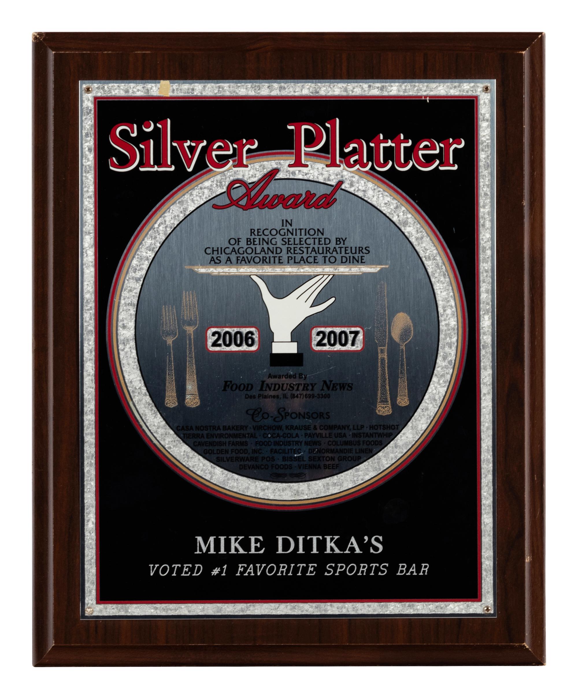 A Group of Nine Dining Awards and Honors Formerly Displayed at Mike Ditka’s Restaurant