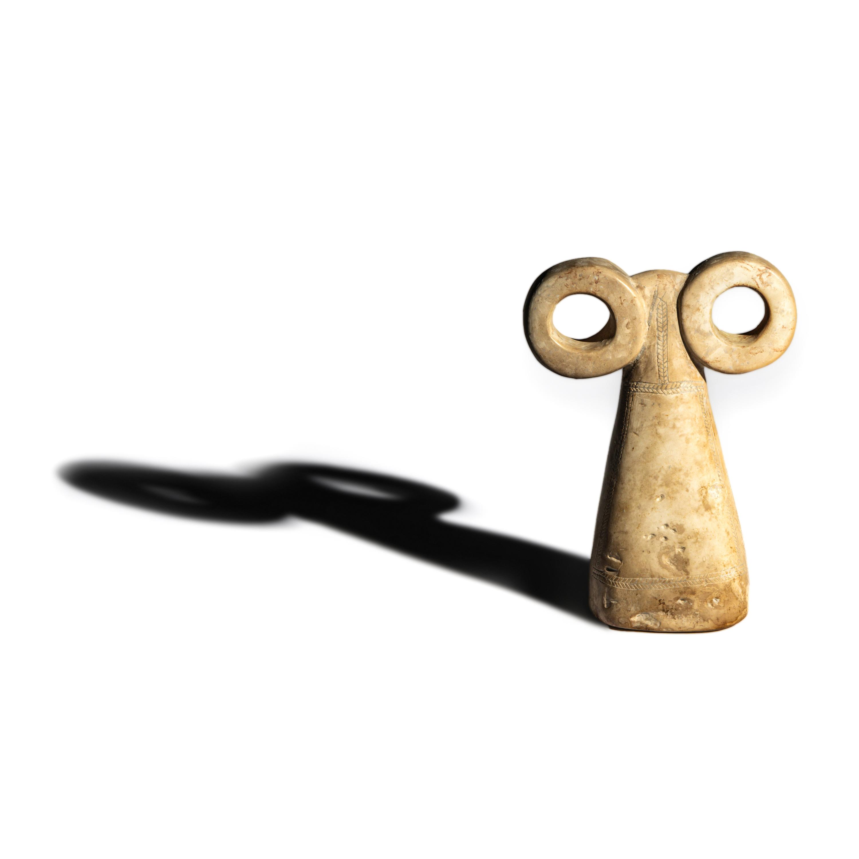 A Mesopotamian Stone Spectacle Idol