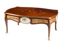 A Louis XV Style Gilt Bronze and Porcelain Mounted Low Table