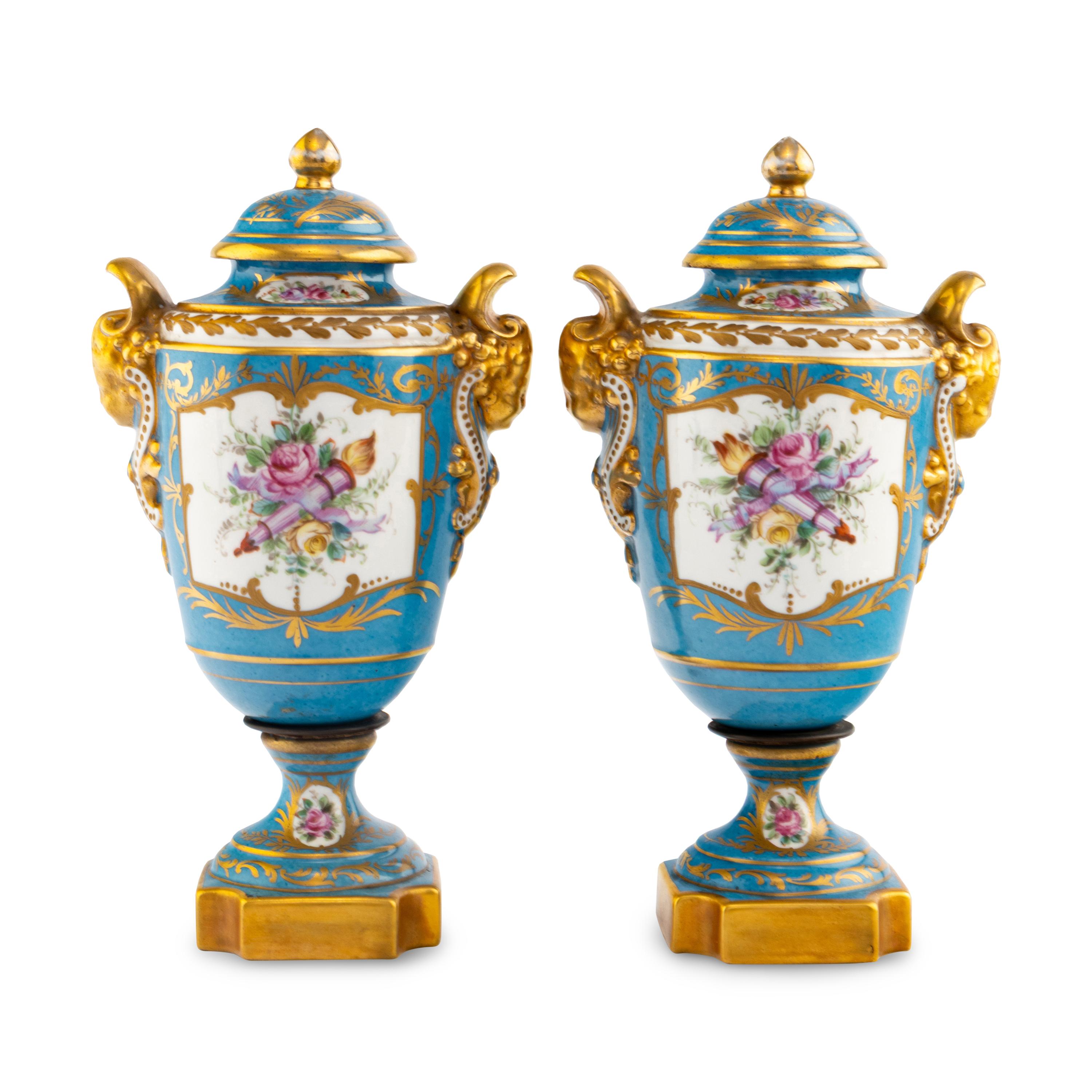 A Pair of Sèvres Style Porcelain Urns
