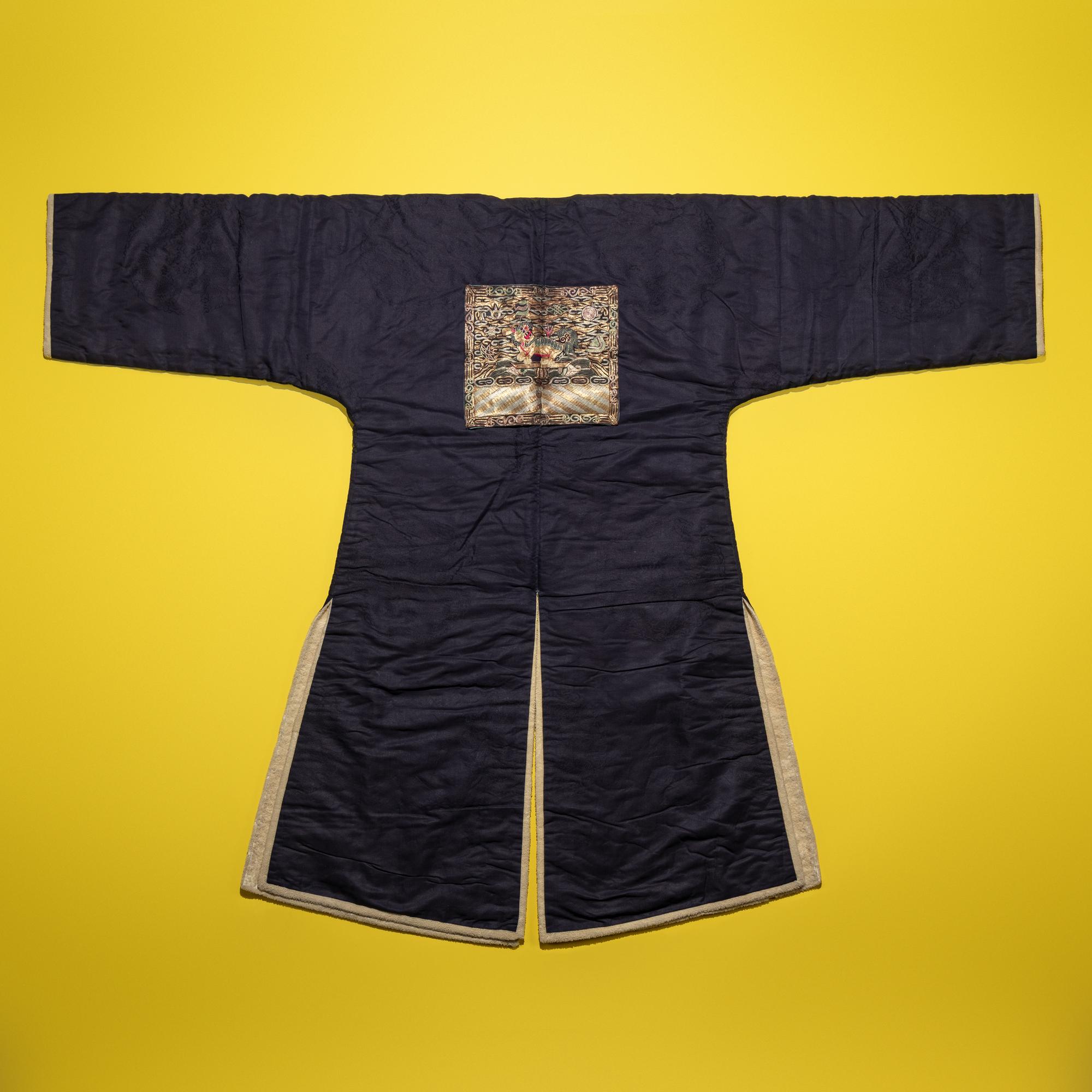 A Chinese Dark Blue Silk Fur Lined Official's Robe, Bufu , Late Qing Dynasty — 清晚期 石青地四品武官冬補服