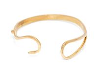 A 14 Karat Yellow Gold and Ruby Bangle Bracelet,