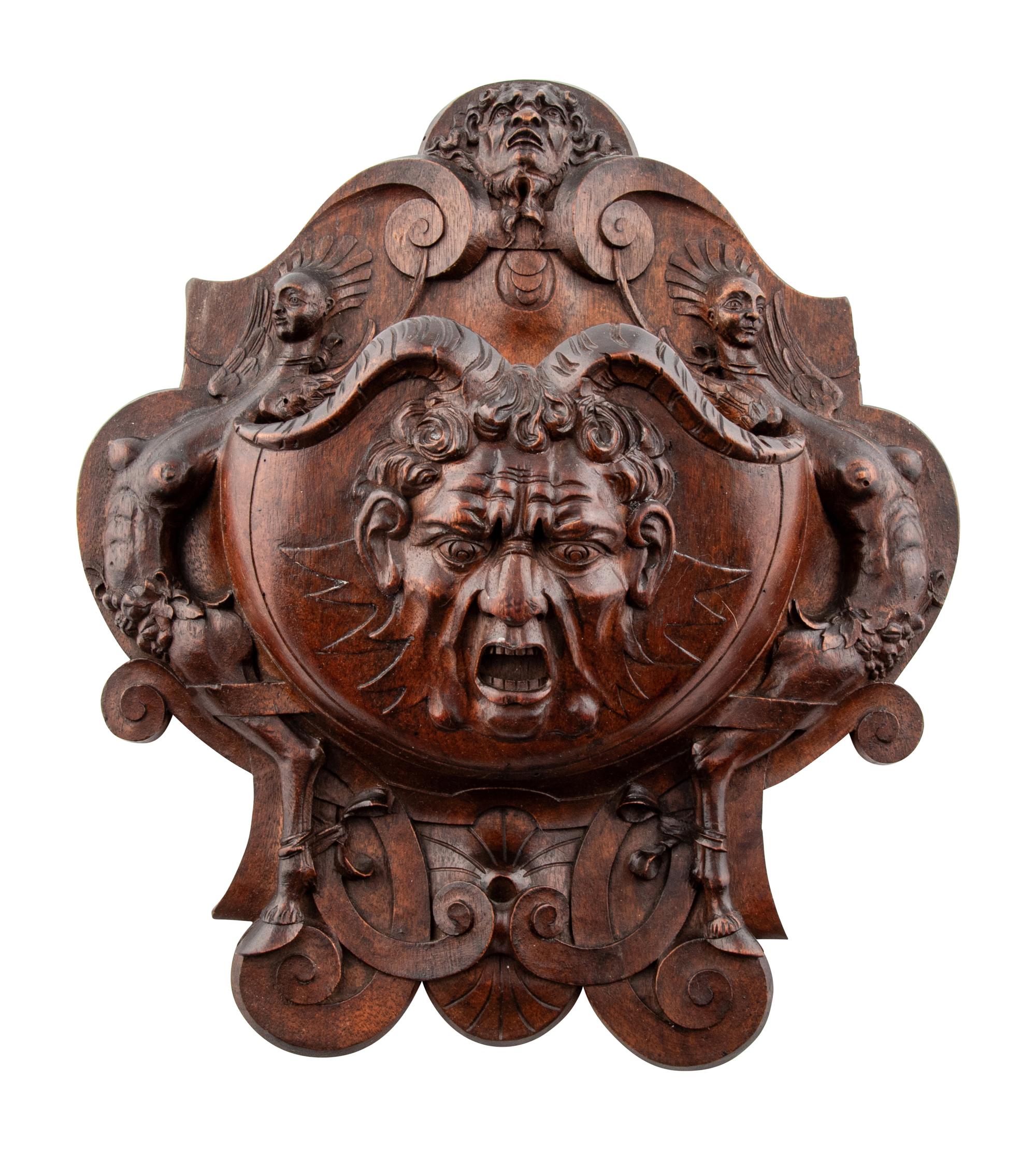 An Italian Carved Walnut Wall Pocket