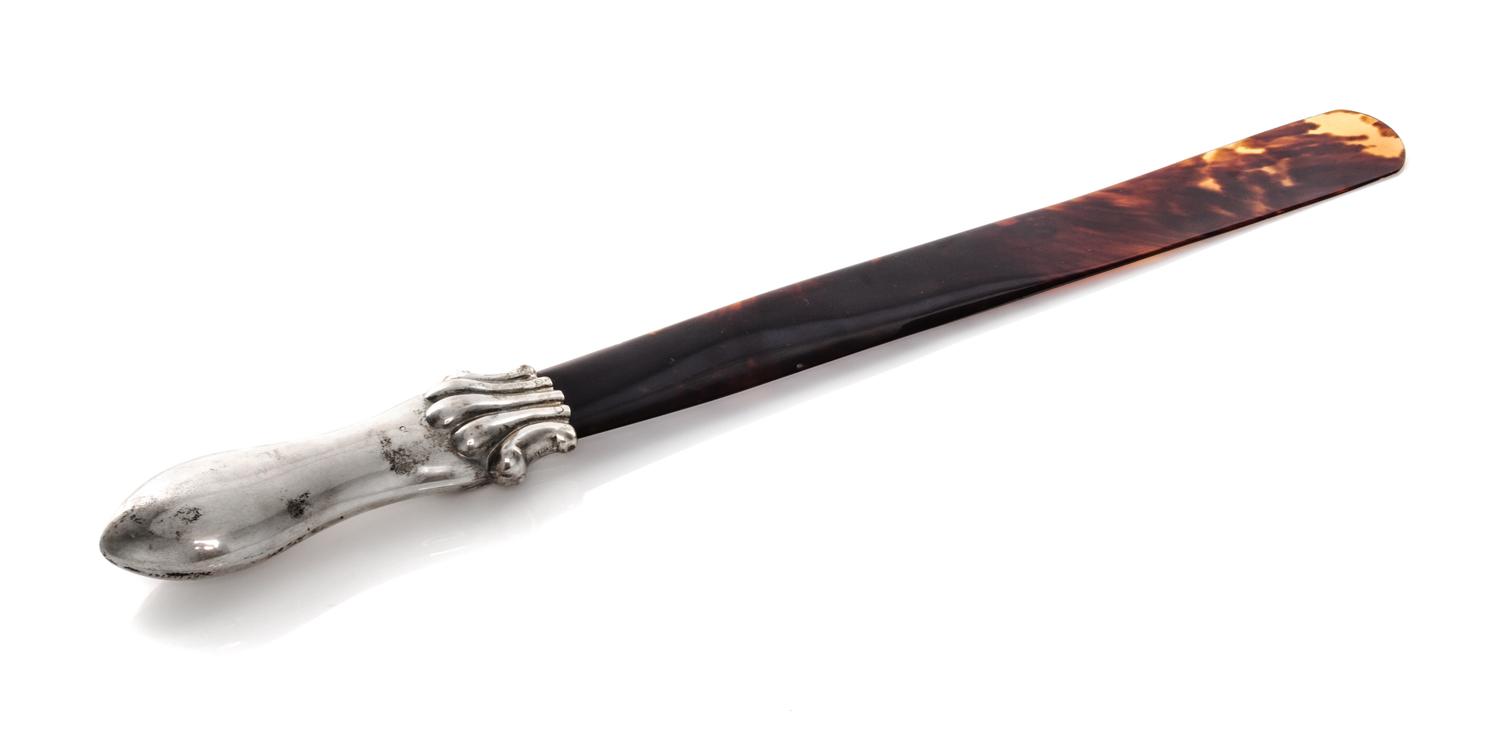 A Victorian Silver and Tortoise Shell Page Turner, 19th Century, the silver handle of partly lobed baluster form, in a fitted presentat