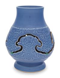 A Claire-de-Lune Glazed Carved Porcelain Reticulated Vase