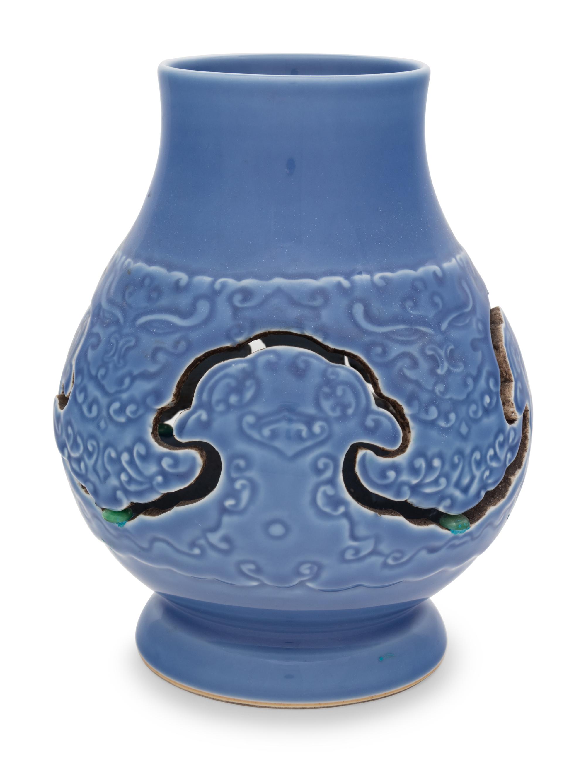 A Claire-de-Lune Glazed Carved Porcelain Reticulated Vase