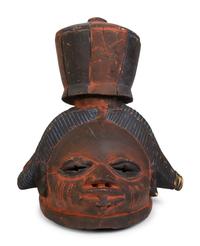 A Group of Three Helmet Masks from Tribes of West Africa — 20TH CENTURY
