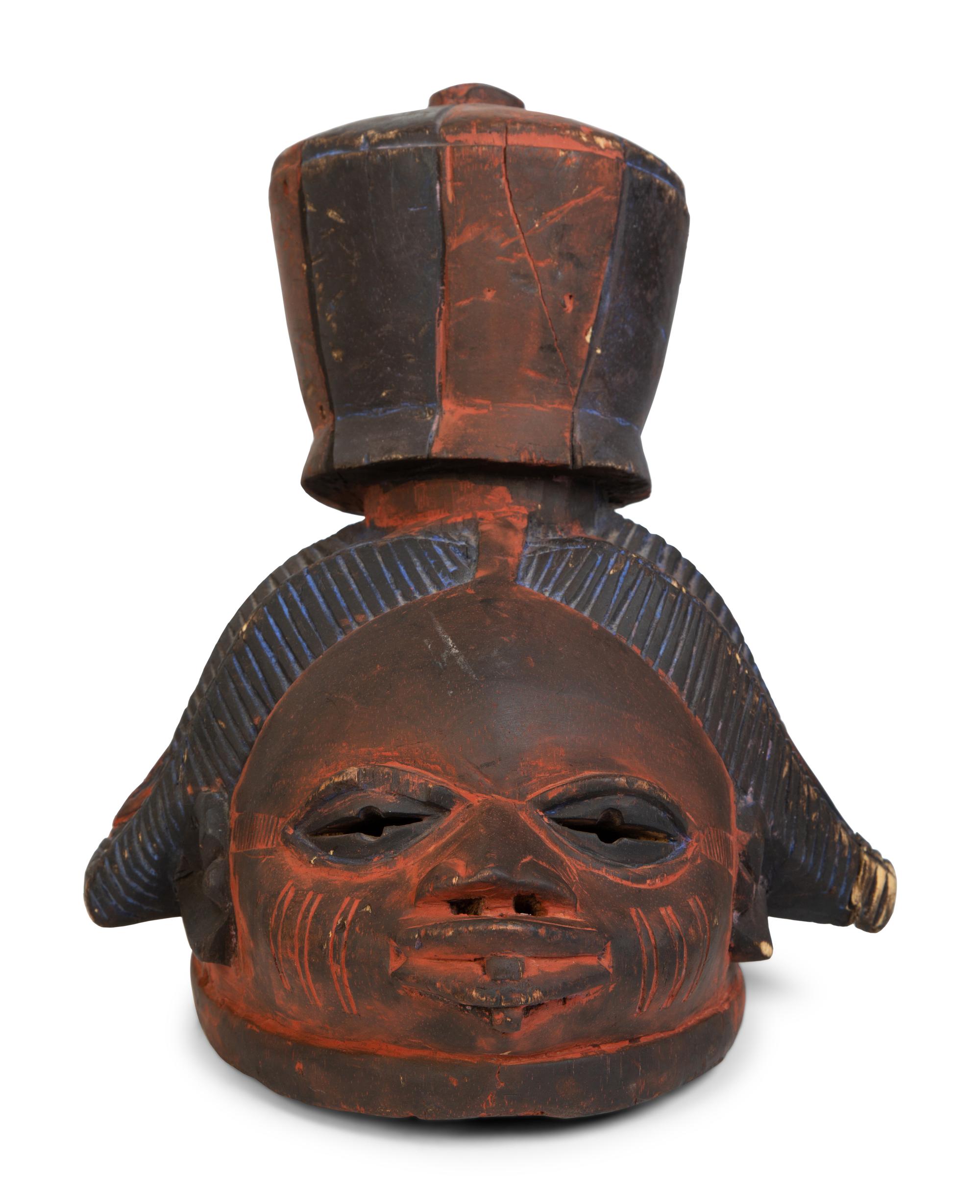 A Group of Three Helmet Masks from Tribes of West Africa — 20TH CENTURY