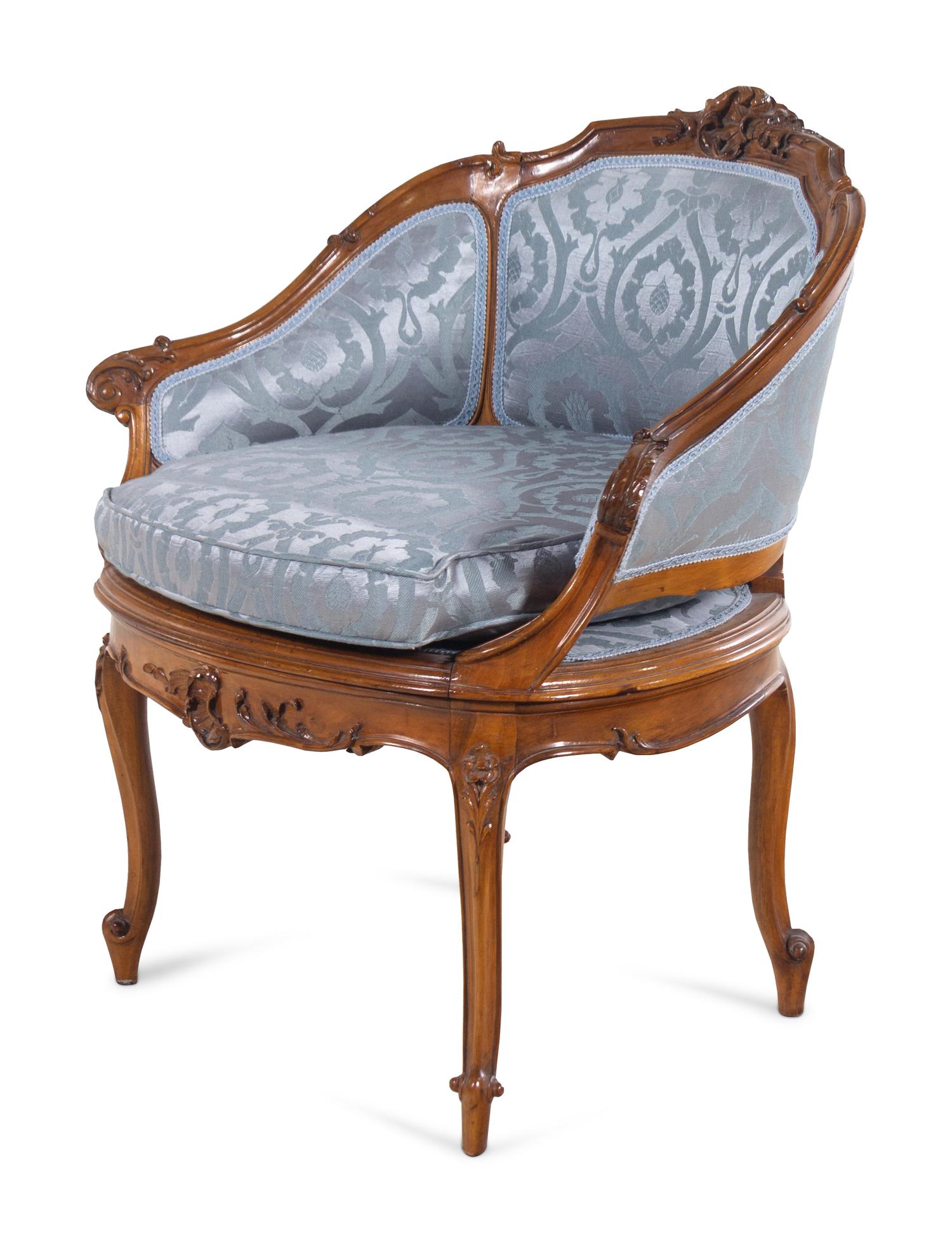 A Louis XV Style Walnut Bergère de Bureau