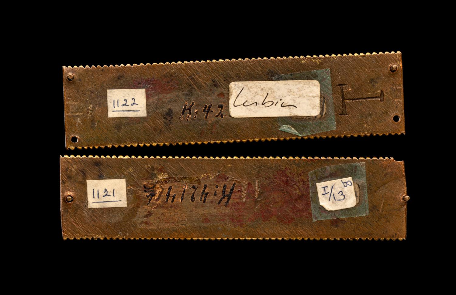 Two Rhenish-Mosan Champlevé and Gilt Copper Rectangular Plaques