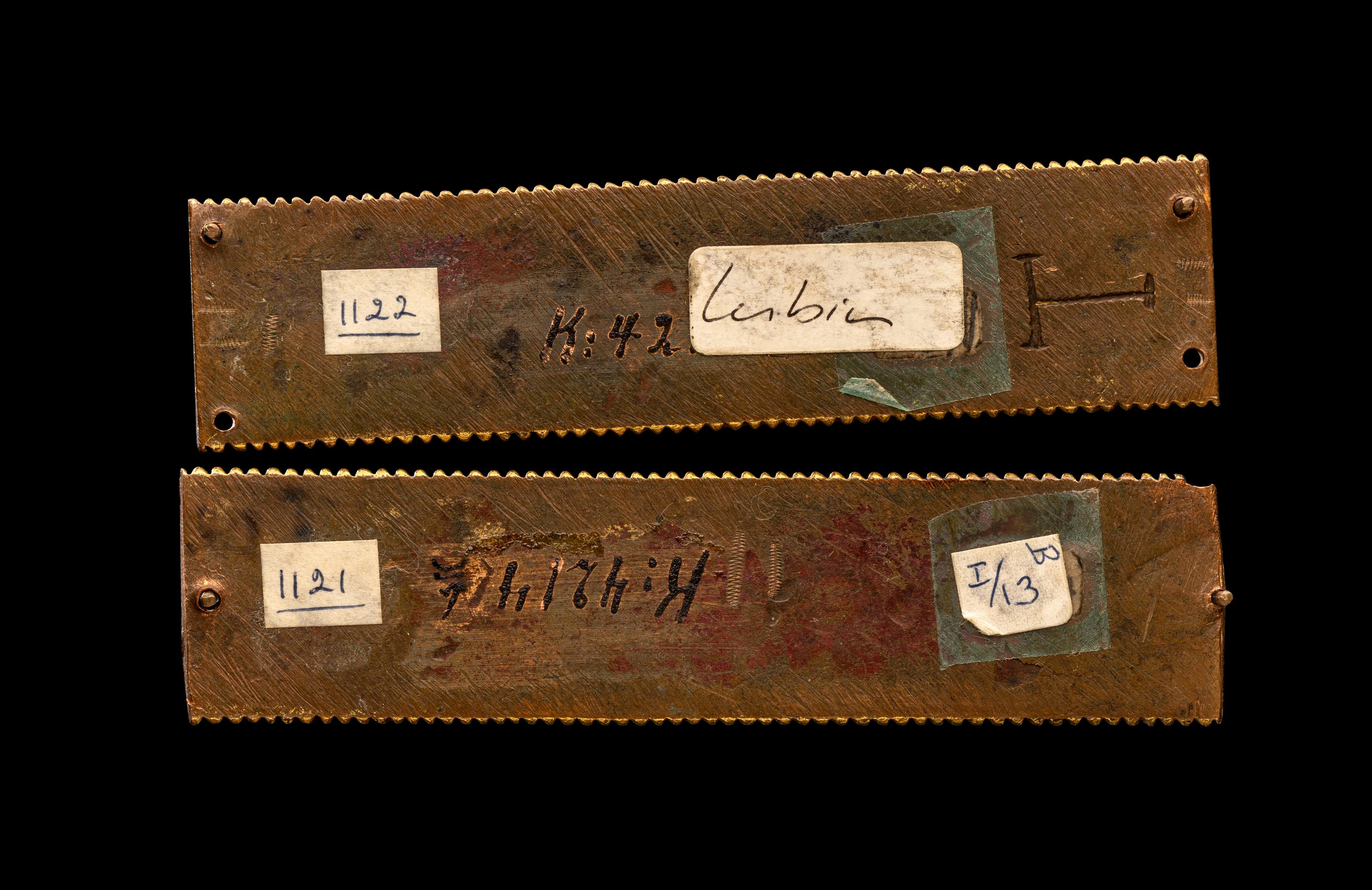 Two Rhenish-Mosan Champlevé and Gilt Copper Rectangular Plaques