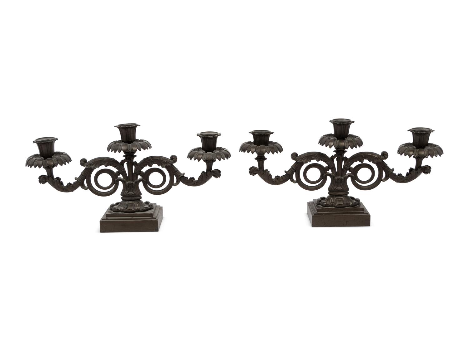 A Pair of Regency Bronze Three-Light Candelabra