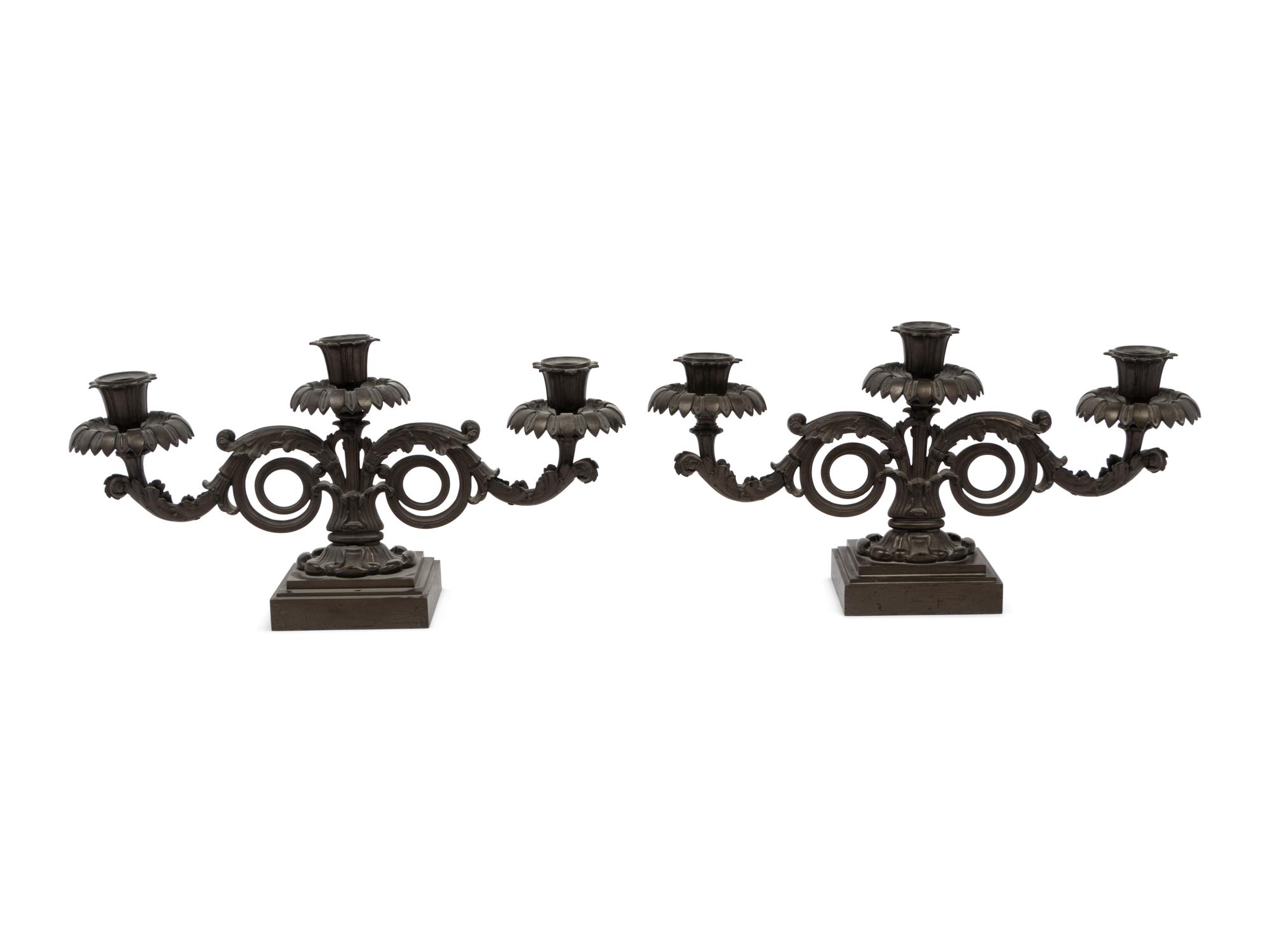 A Pair of Regency Bronze Three-Light Candelabra