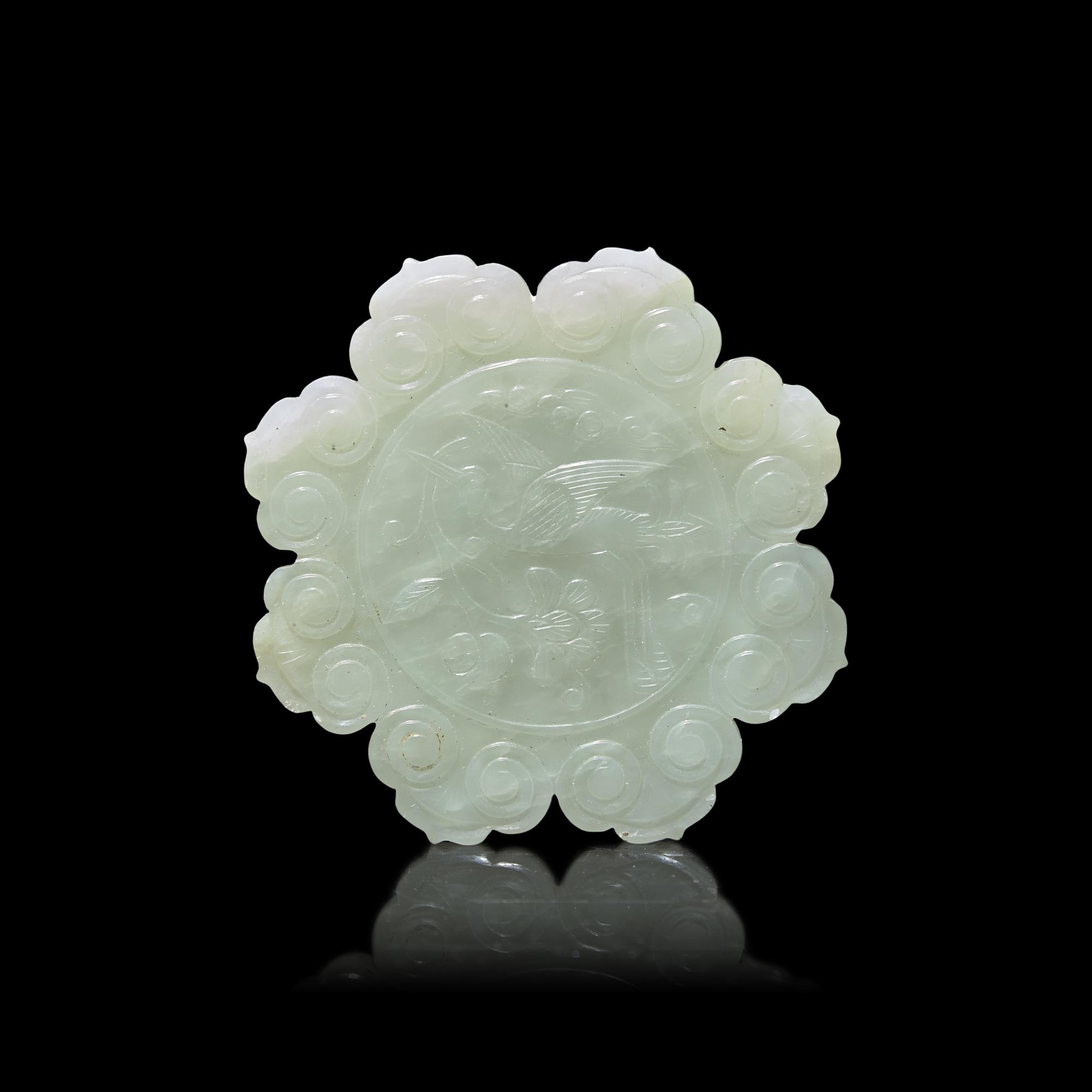 A Large Chinese Pale Celadon Jade Floriform Pendant, 19th Century 清晚期 青白玉花片