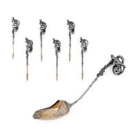 A Tiffany and Co. Silver Nut Scoop and Set of Six Nut Picks
