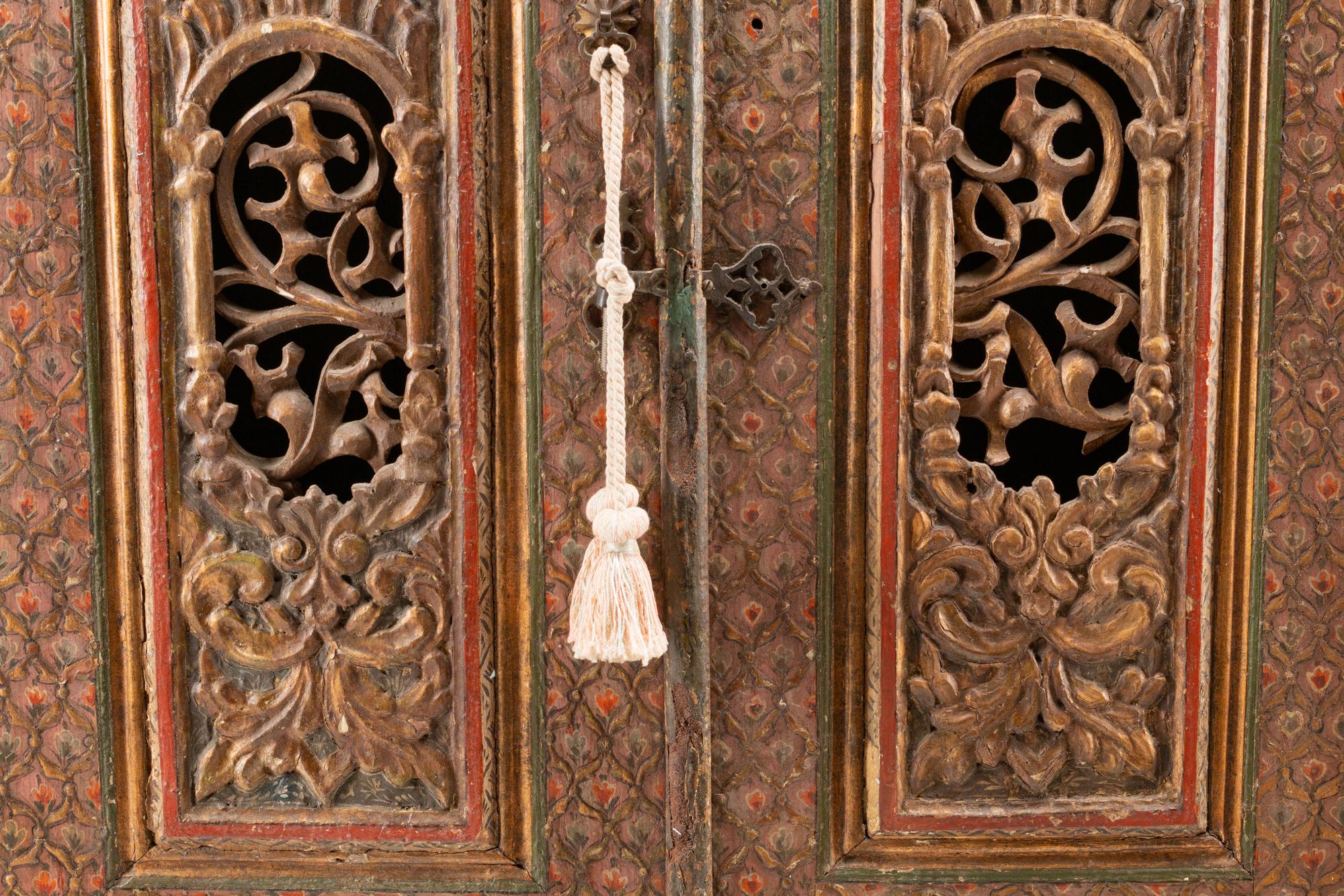 A Continental Painted and Parcel Gilt Cabinet