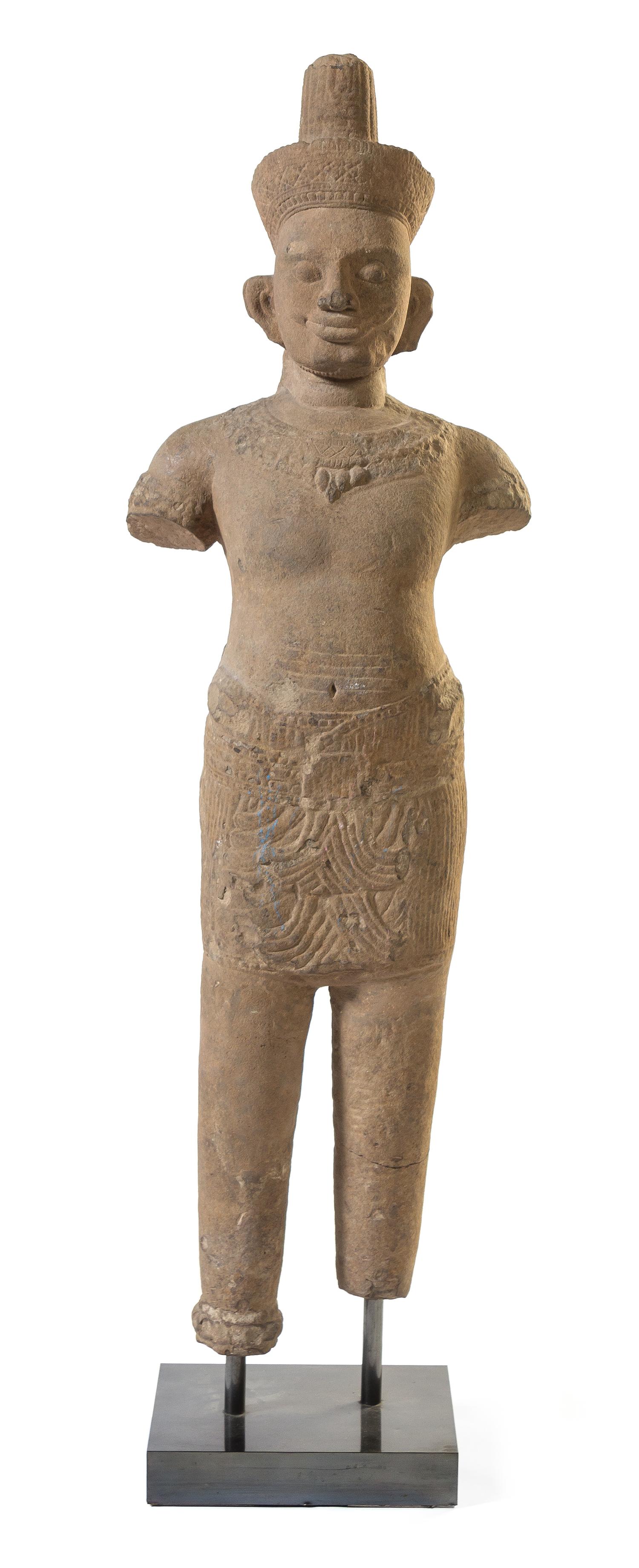 A Khmer Sandstone Figure of a Male Deity Height of figure 58 3/4 inches. — POSSIBLY 10TH-12TH CENTURY