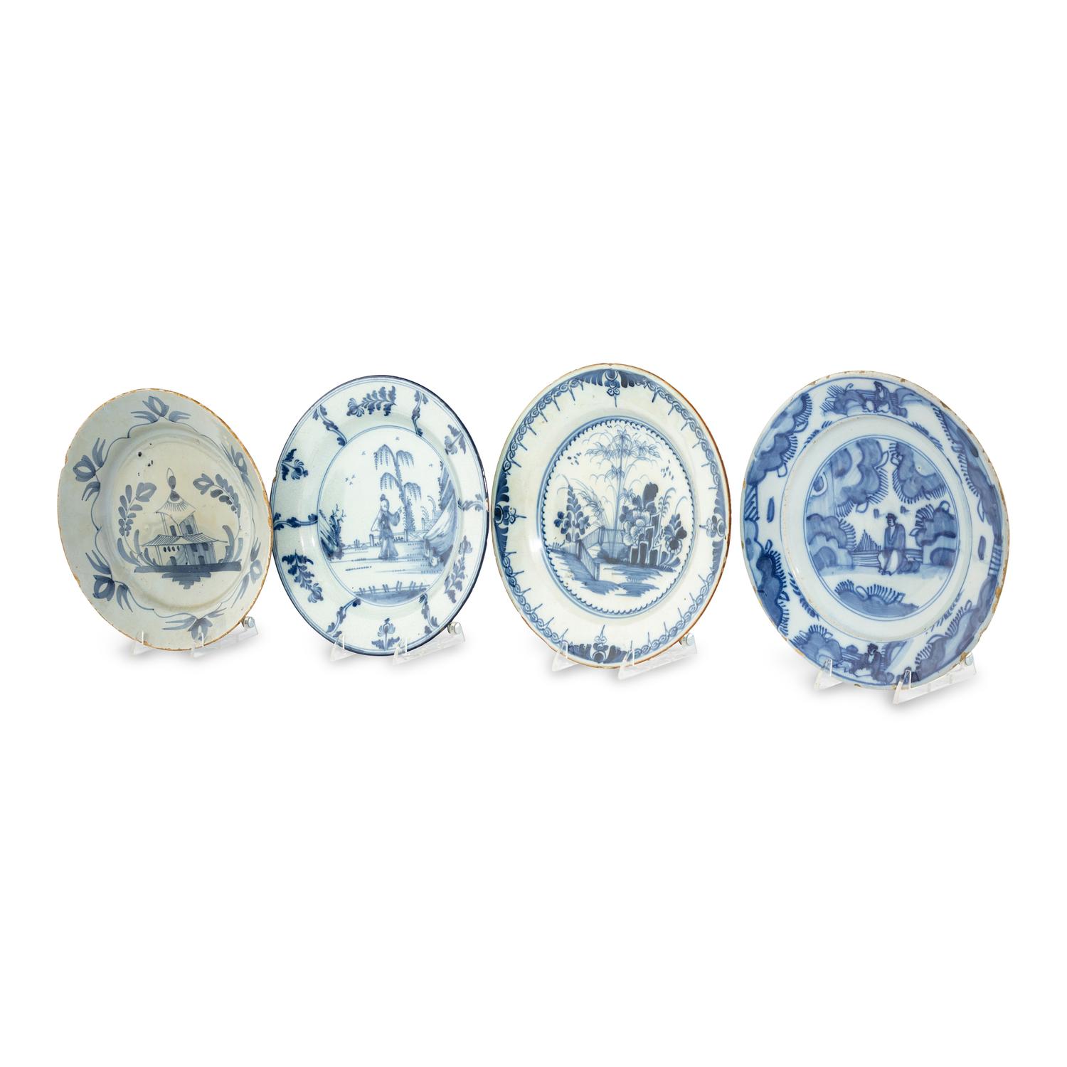 A Collection of Four Delft Blue and White Plates