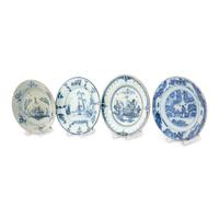 A Collection of Four Delft Blue and White Plates