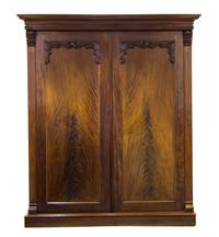 A Victorian Mahogany Armoire, Height 84 1/2 x width 69 3/4 x depth 26 1/2 inches.