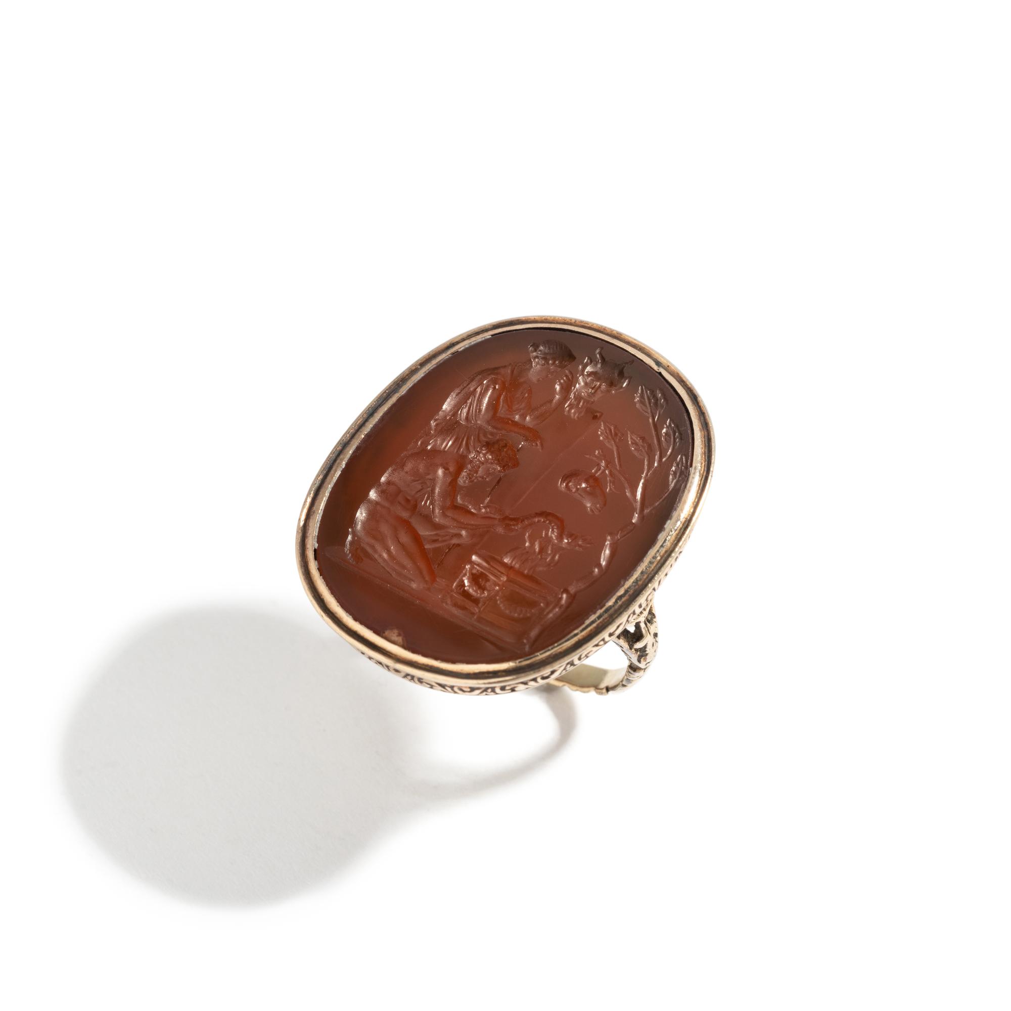 A Neoclassical Carnelian and Gold Finger Ring with a Mythological Scene