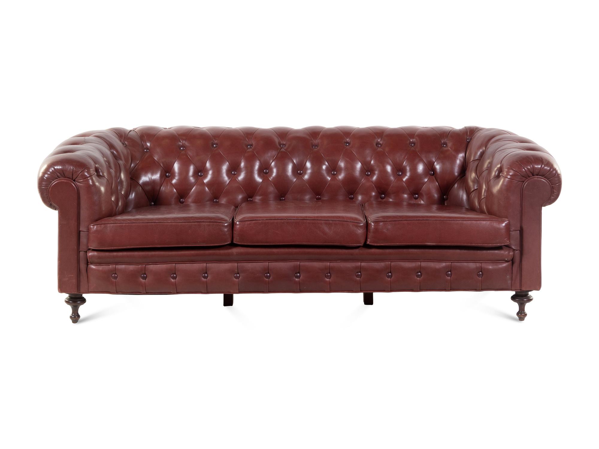 A Leather-Upholstered Chesterfield Sofa