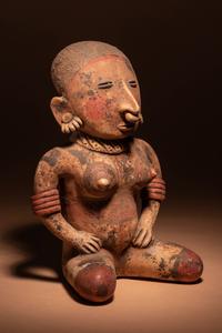 A Nayarit Terracotta Seated Female Figure