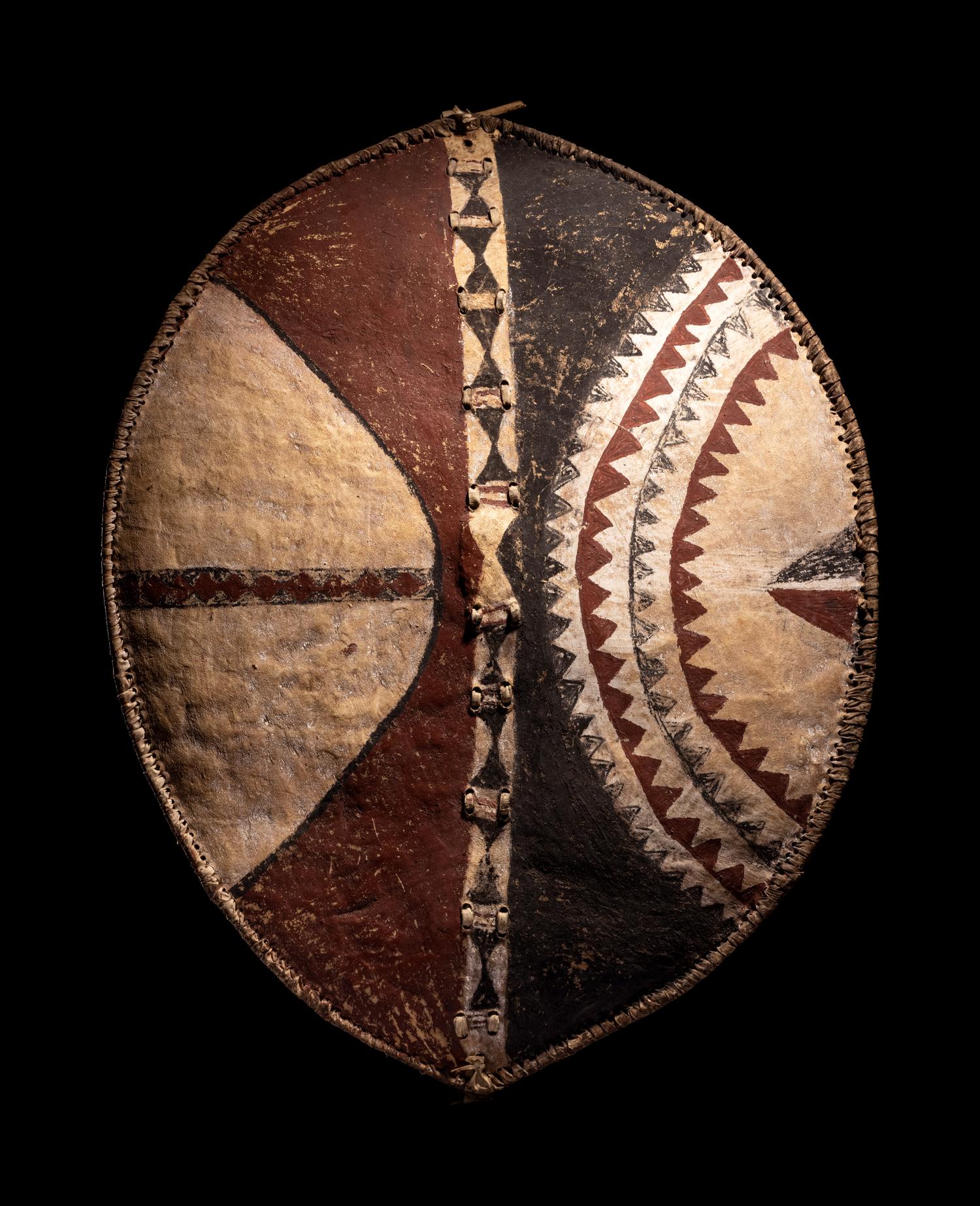 A Maasai Painted Hide Shield and Milk Gourd