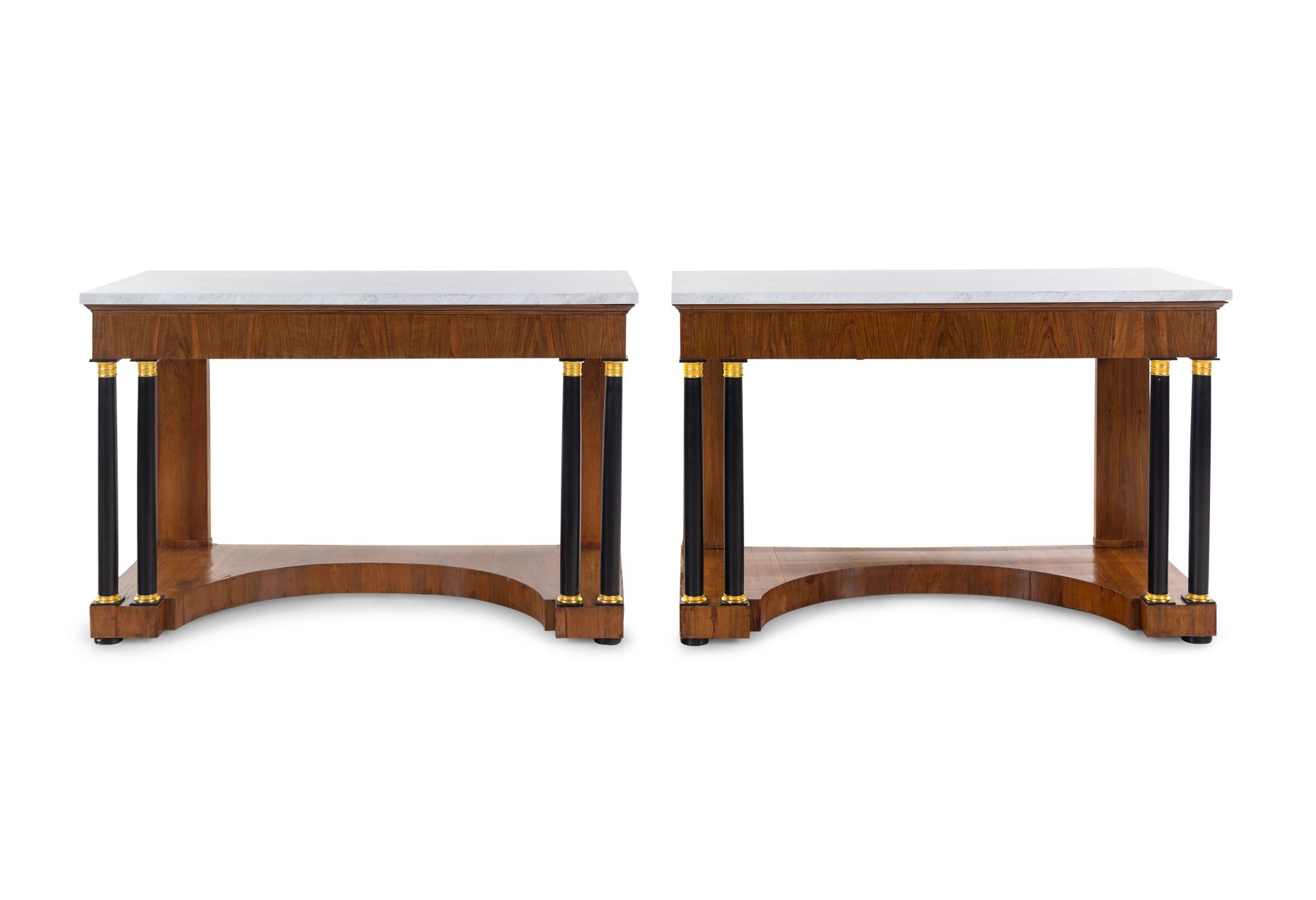 A Pair of Russian Empire Gilt Metal Mounted Parcel Ebonized Mahogany Marble-Top Console Tables