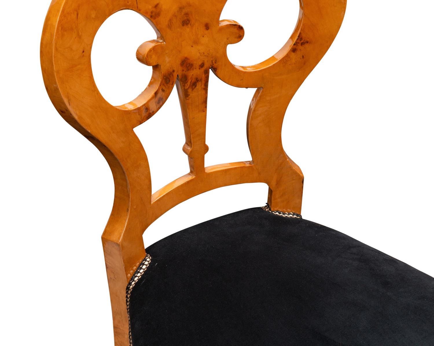 A Set of Twelve Biedermeier Style Burlwood Dining Chairs