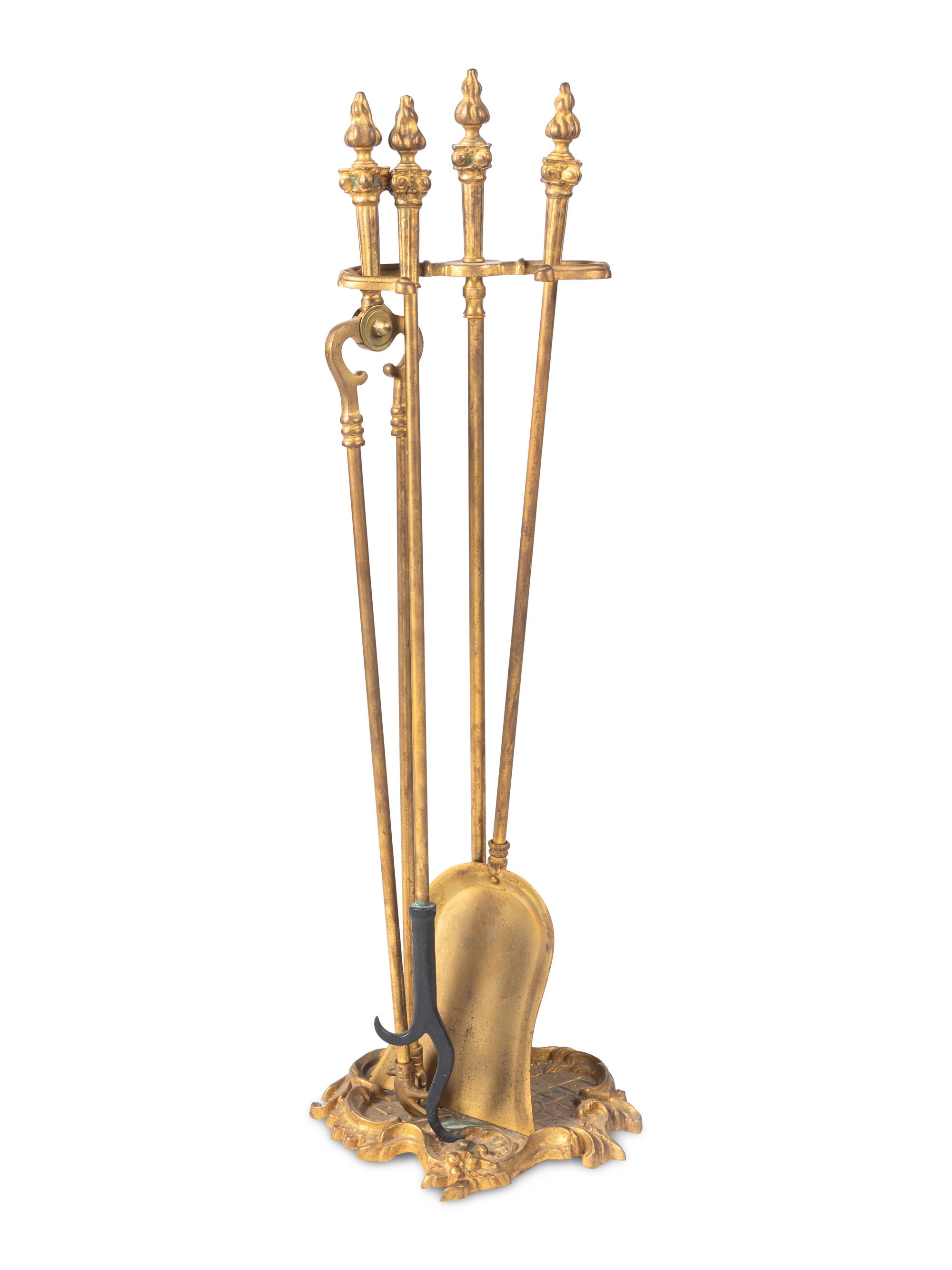 A Set of Louis XV Style Gilt Bronze Fire Tools