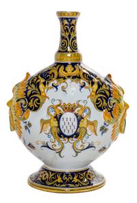 A Quimper Pottery Vase Height 14 1/2 inches.