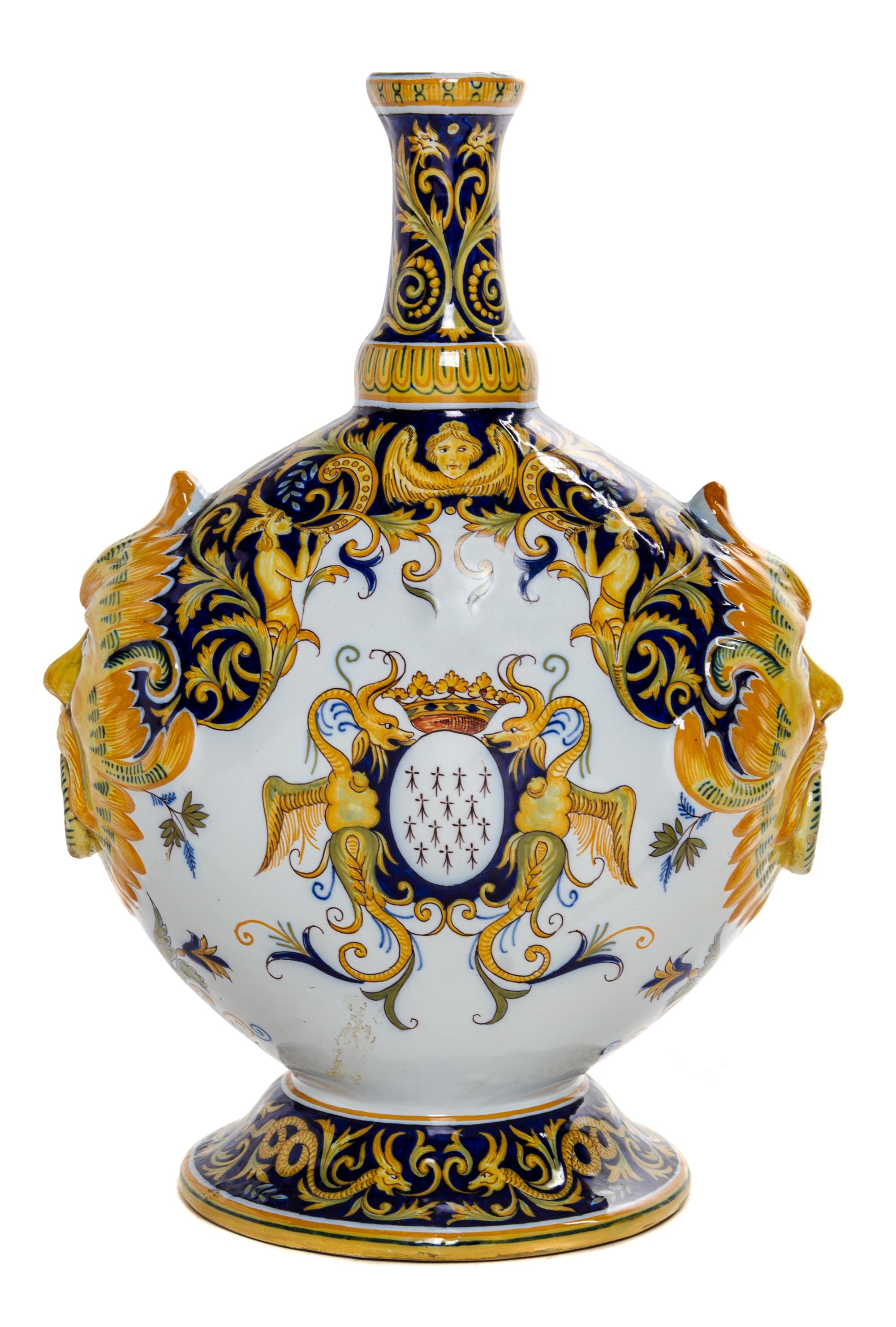 A Quimper Pottery Vase Height 14 1/2 inches.