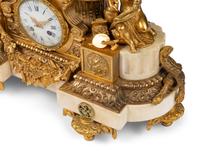 A French Gilt Bronze and Marble Mantel Clock