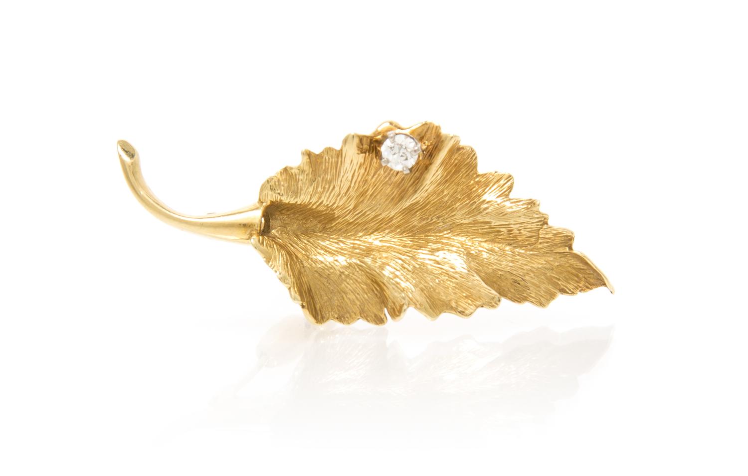 A 14 Karat Yellow Gold and Diamond Leaf Brooch, 6.10 dwts.