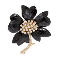 An 18 Karat Yellow Gold and Onyx Flower Brooch, Van Cleef & Arpels, 32.20 dwts.