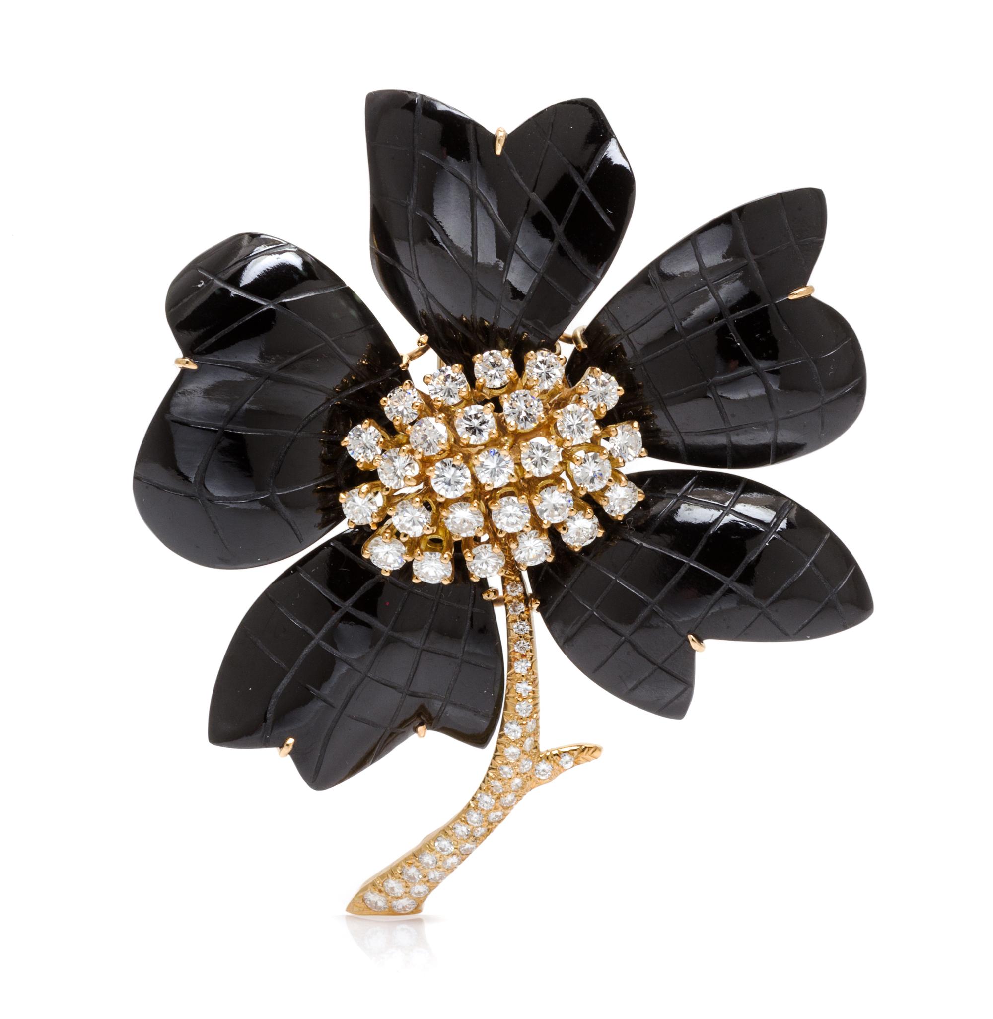 An 18 Karat Yellow Gold and Onyx Flower Brooch, Van Cleef & Arpels, 32.20 dwts.