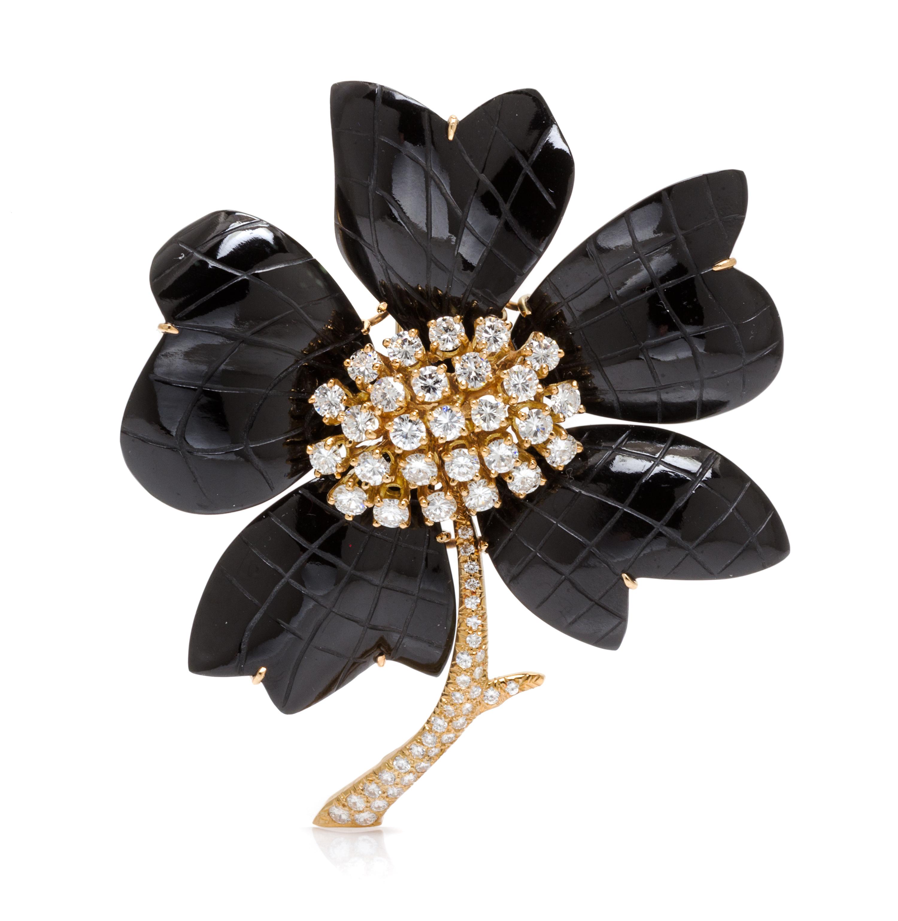 An 18 Karat Yellow Gold and Onyx Flower Brooch, Van Cleef & Arpels, 32.20 dwts.
