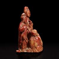 A Chinese carved soapstone figural group