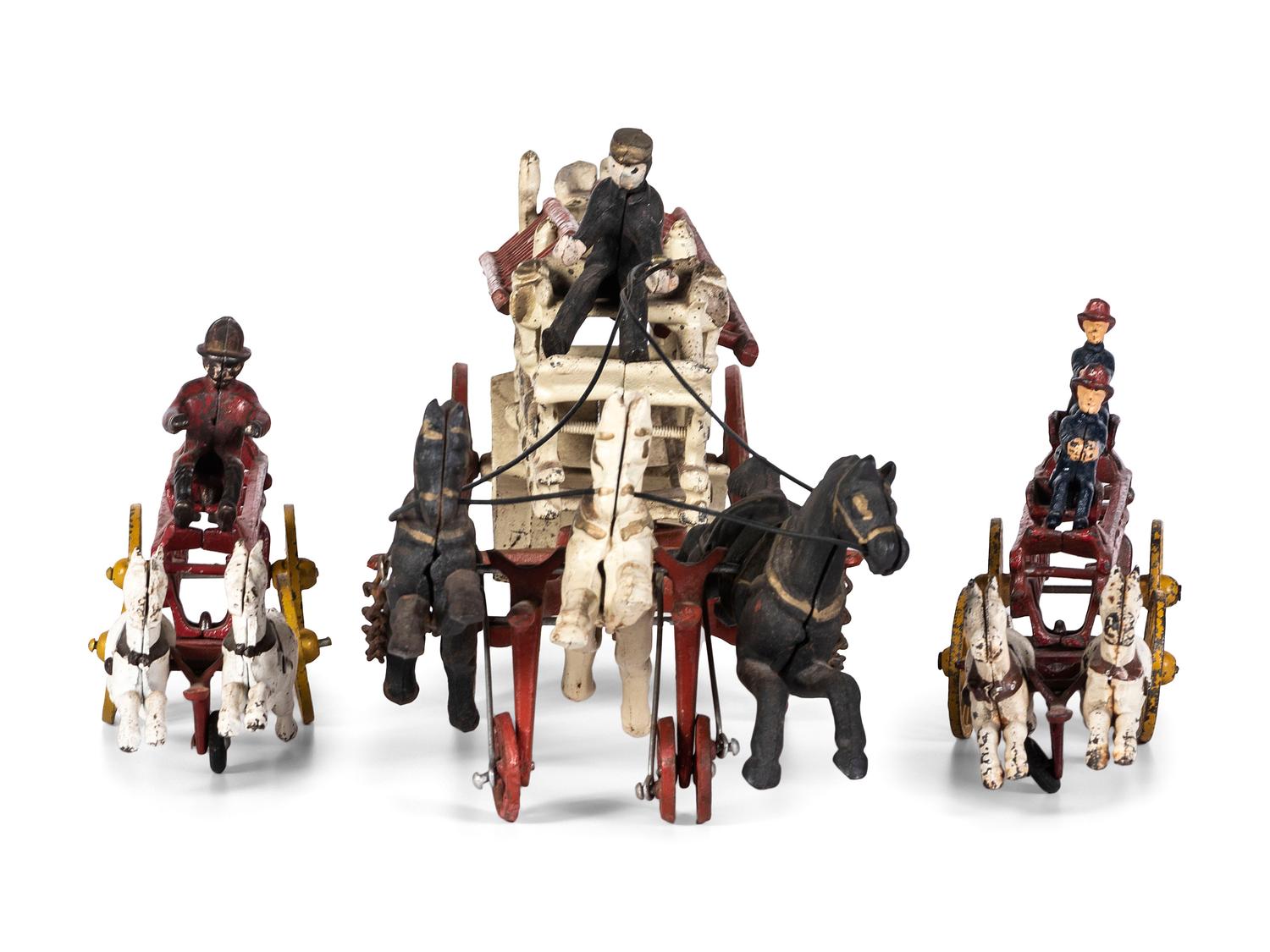 Three Painted Cast Iron Toy Horse Drawn Fire Wagons
