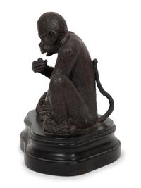 A Continental Bronze Sculpture of a Seated Monkey