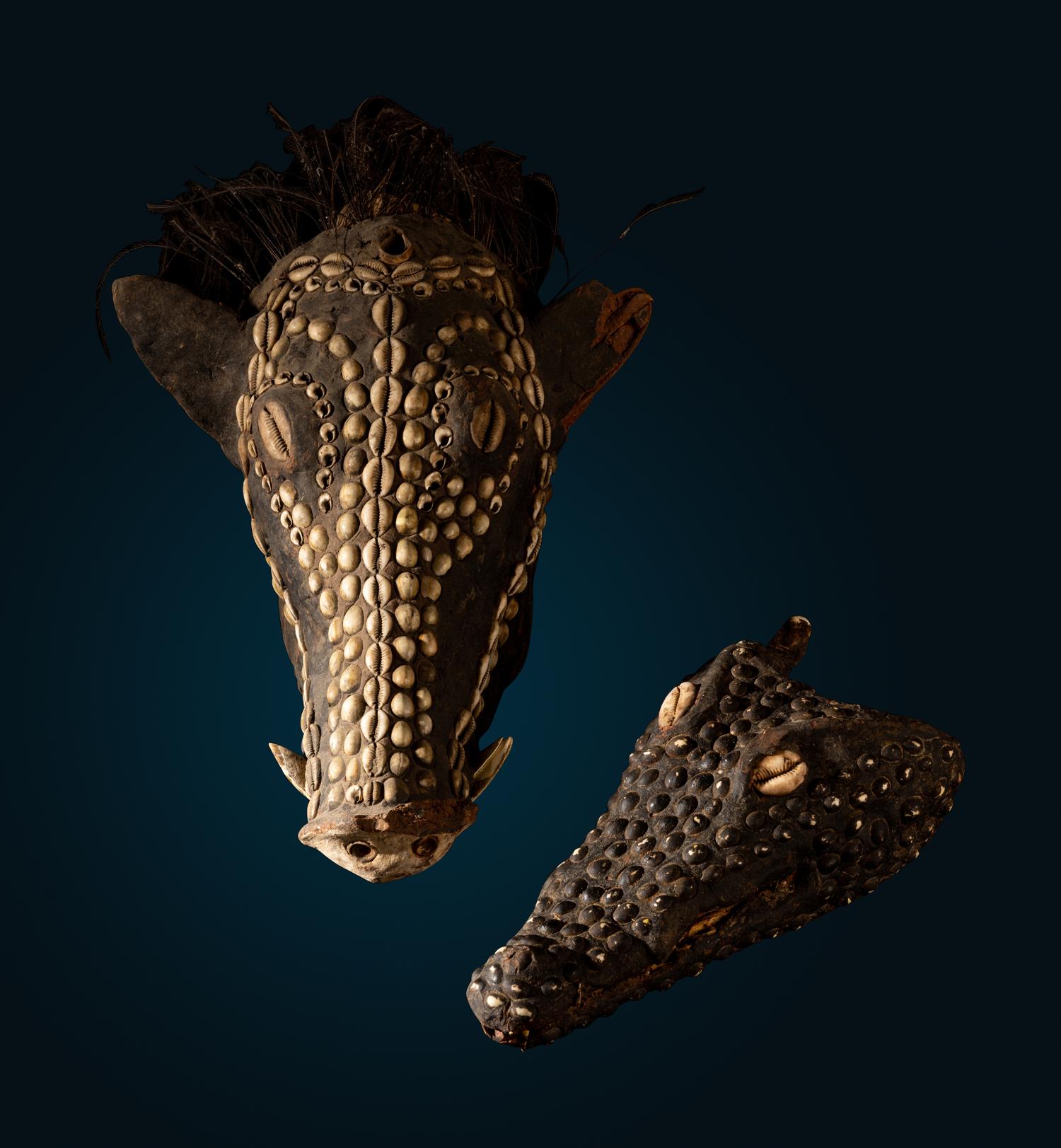 An Oceanic Decorated Crocodile Skull and Boar Skull