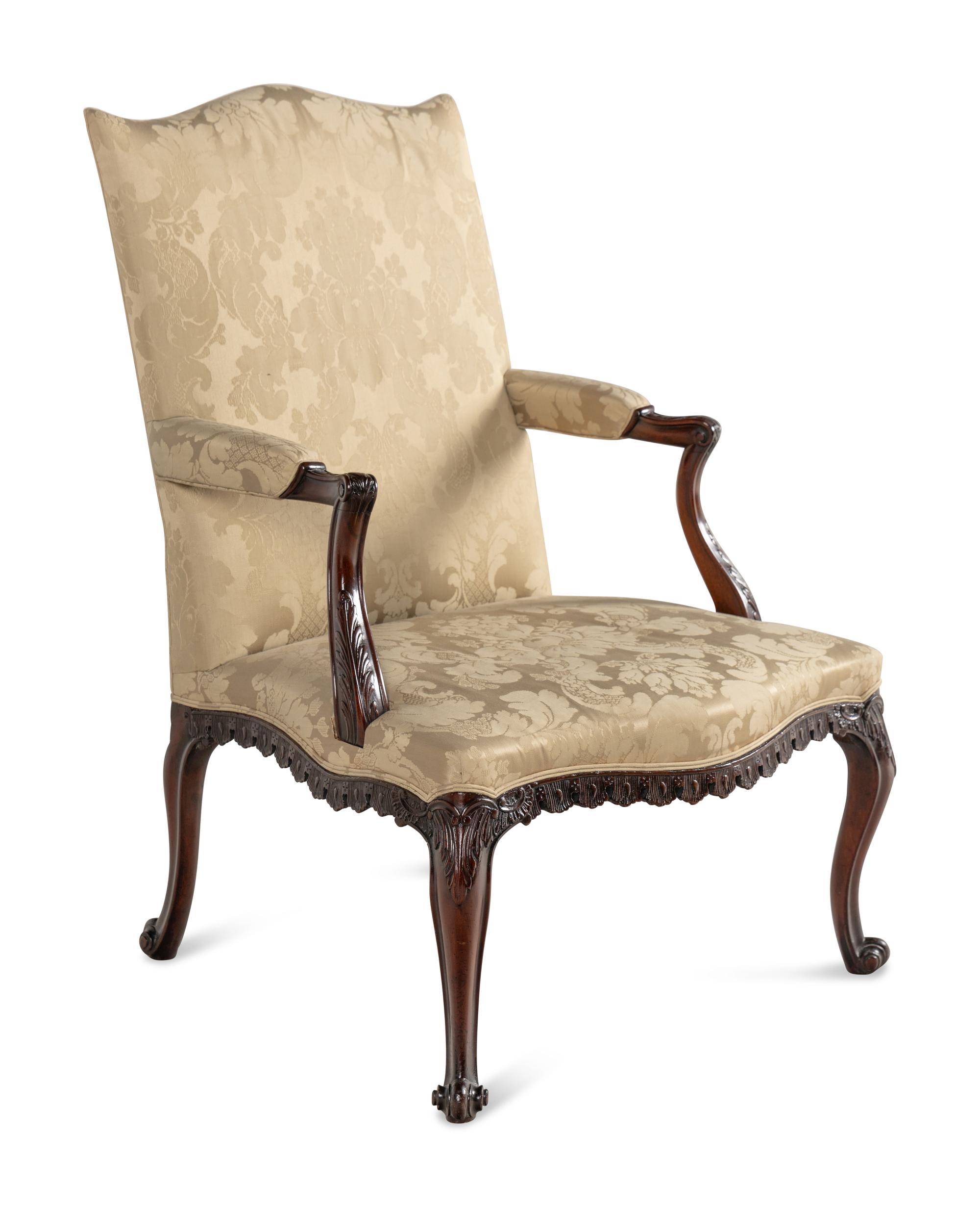 A George III Carved Mahogany Library Chair