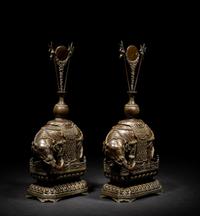 A Pair of Chinese Bronze Figures of Elephants
