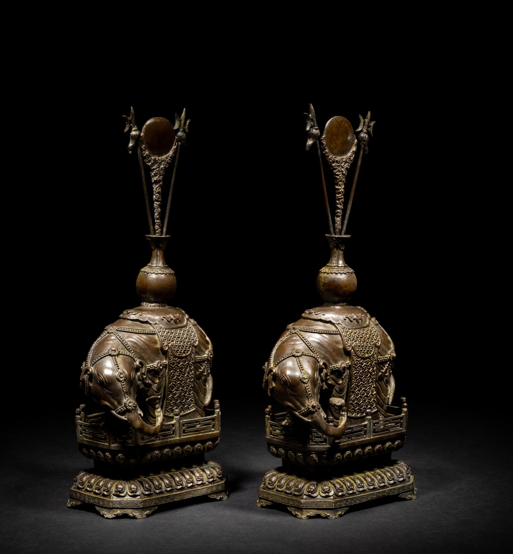 A Pair of Chinese Bronze Figures of Elephants