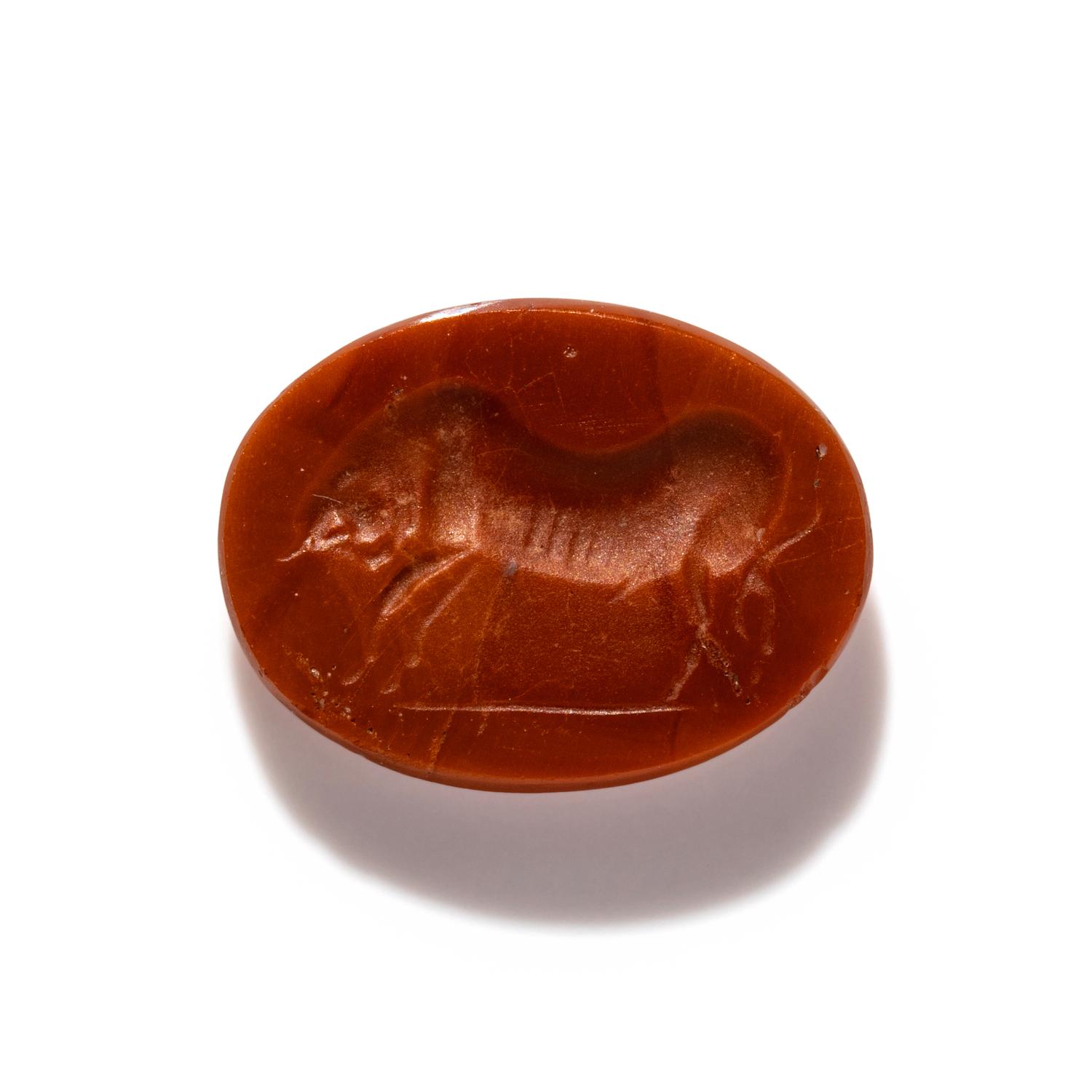 A Roman Carnelian Ring Stone with a Charging Bull
