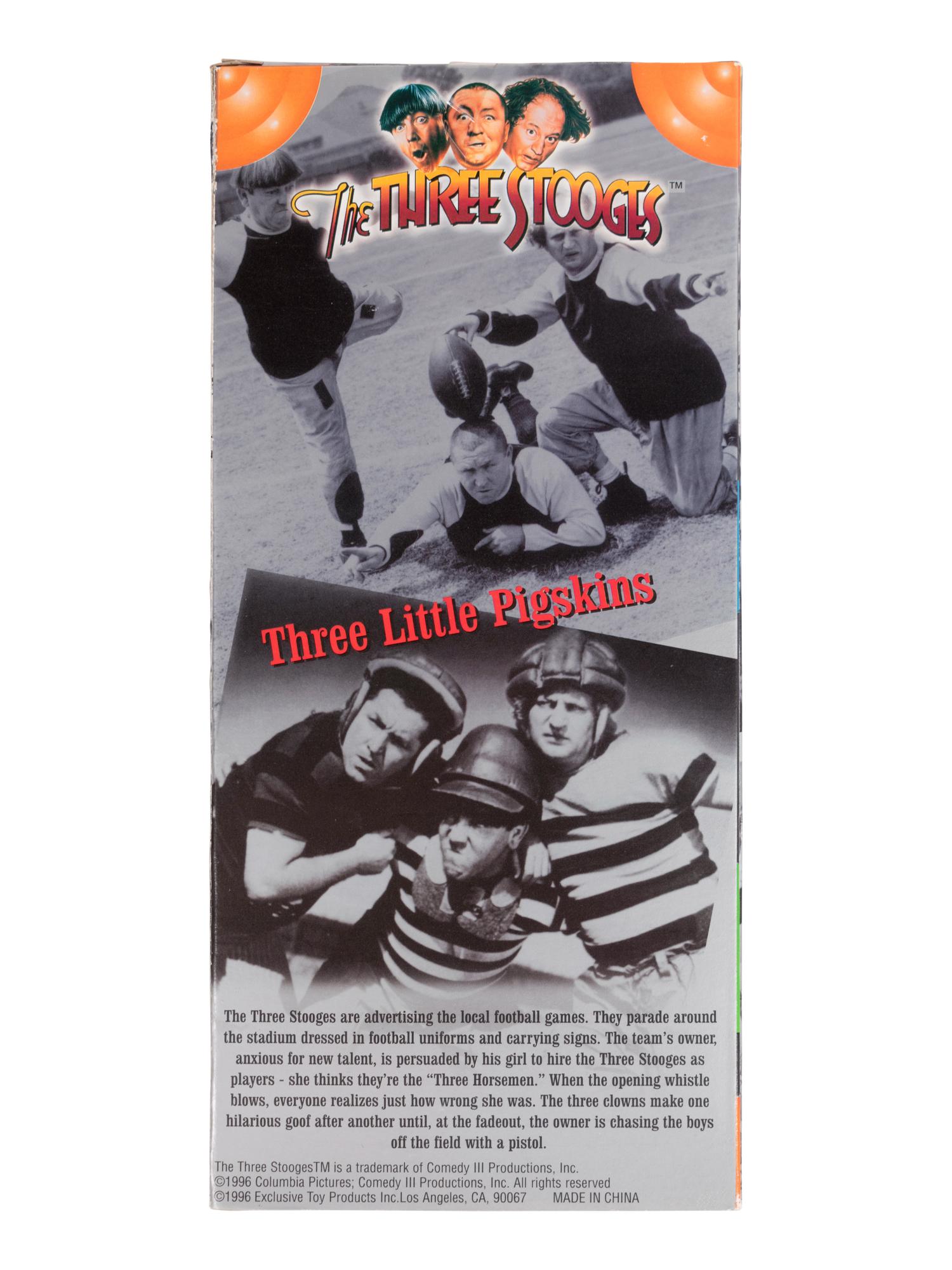 (Film Memorabilia) A group of 5 dolls from three comedies, comprising:
