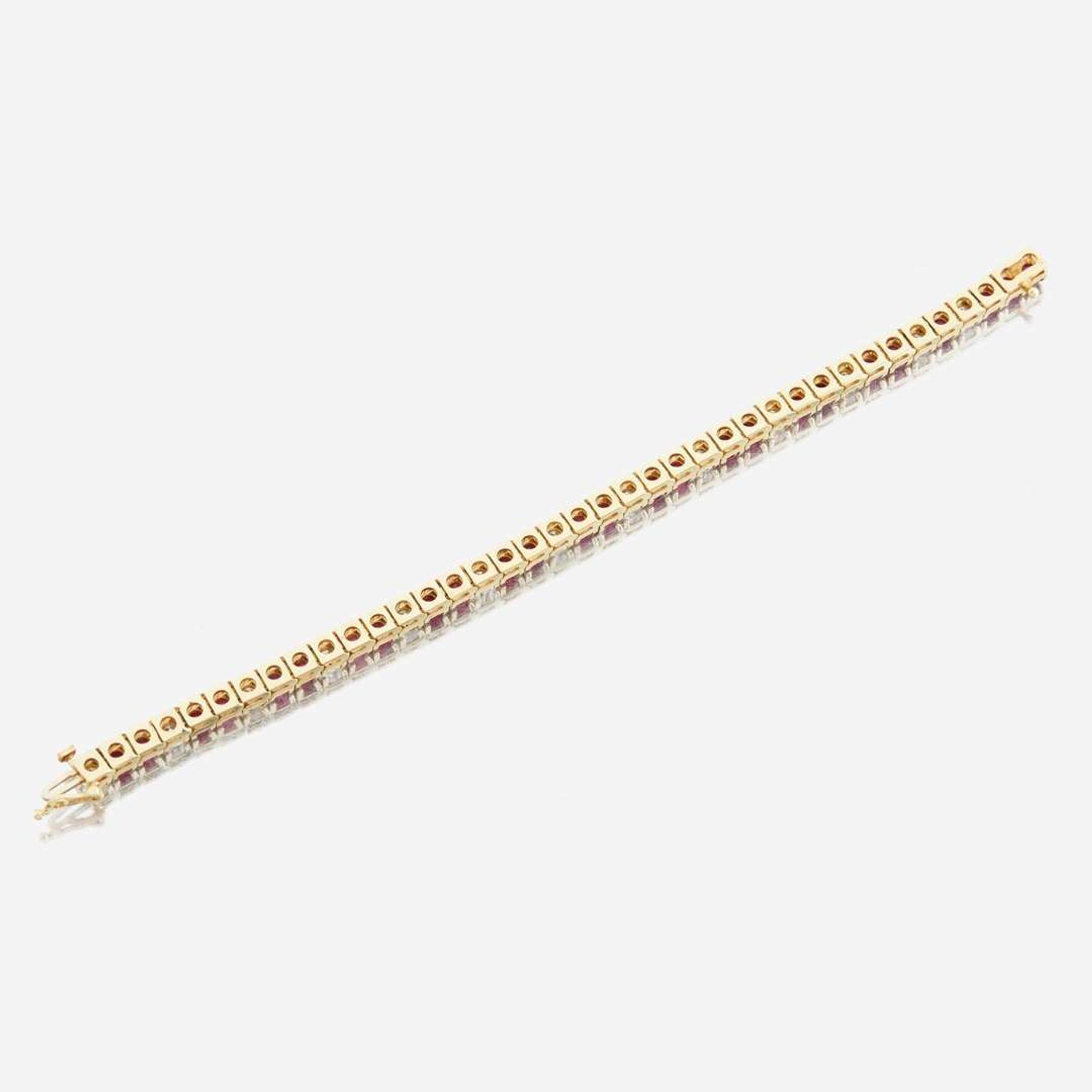 A ruby, diamond, and gold bracelet